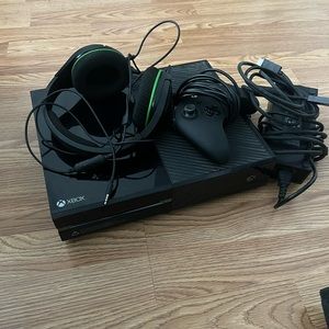 Xbox system comes with a controller, headphones power plug and HDMI cord